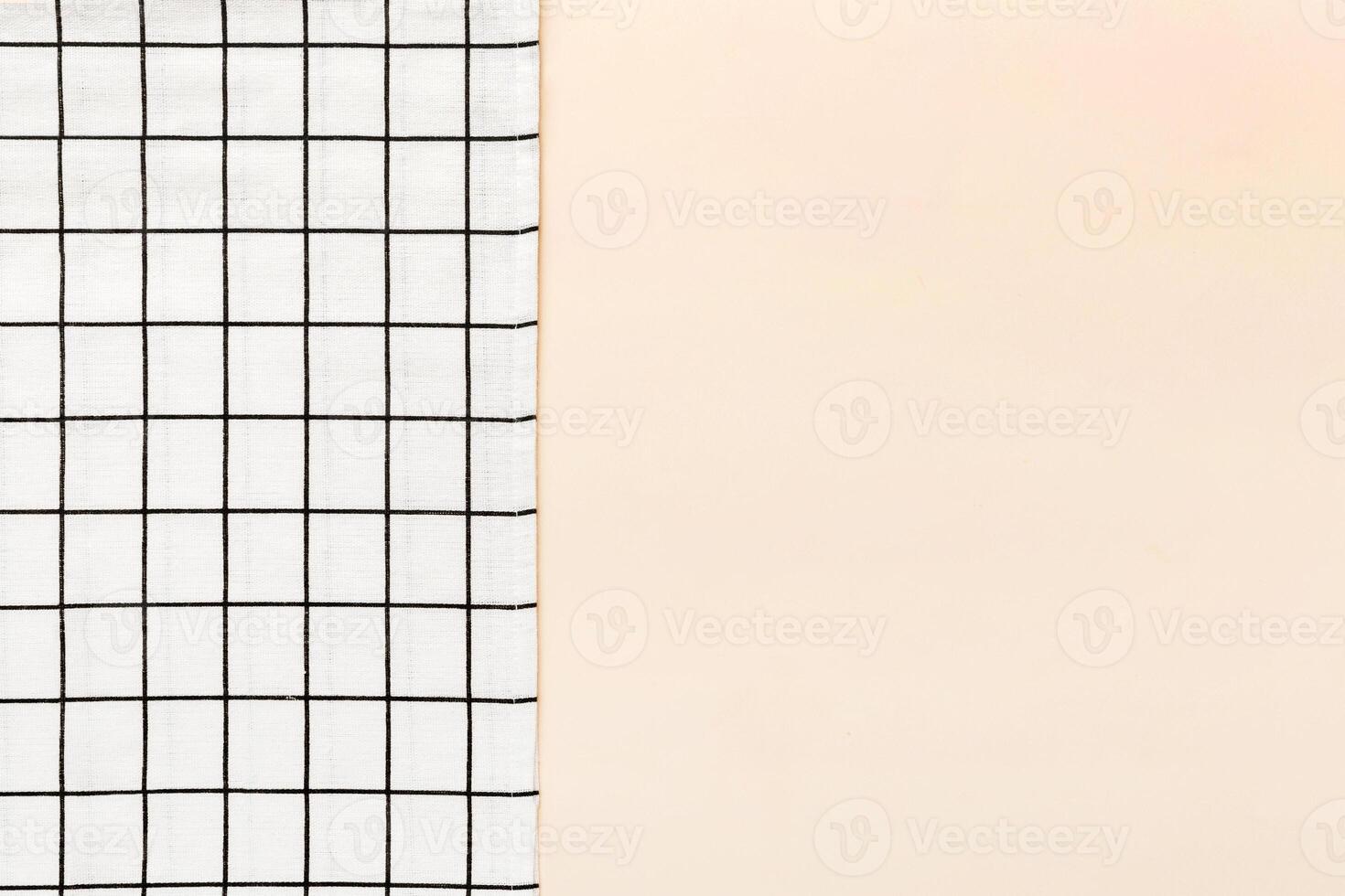 top view with empty kitchen napkin isolated on table background. Folded cloth for mockup photo