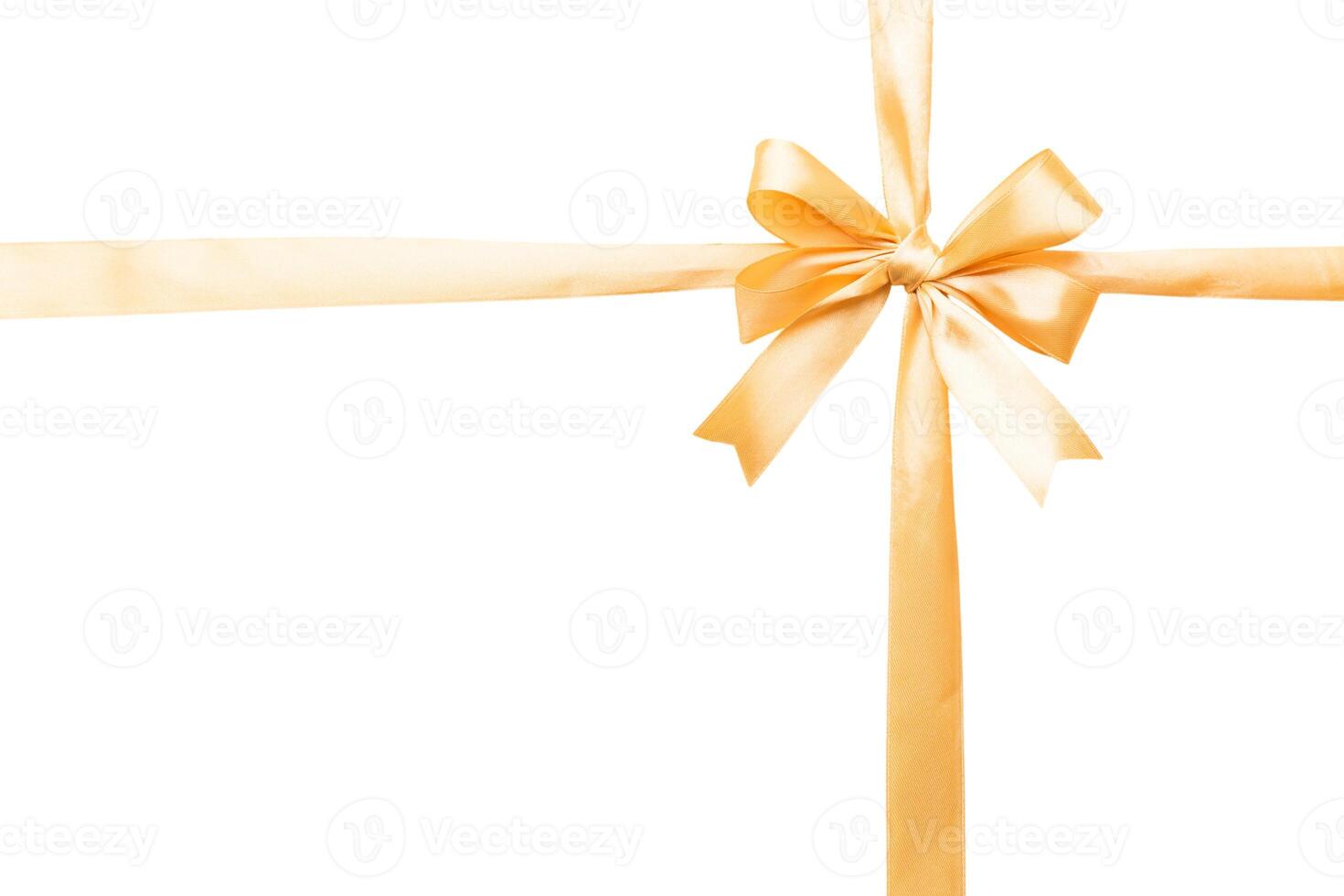 Gold ribbon bow isolated white background. empty space photo