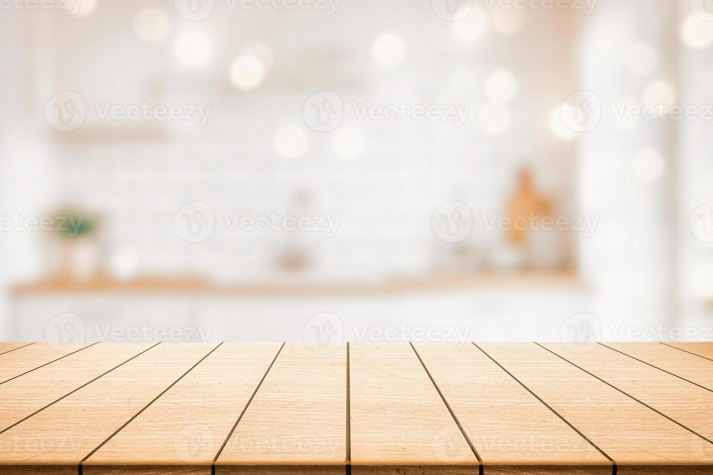 Wooden table mockup with blurred kitchen background and natural light bokeh, perfect for product display photo
