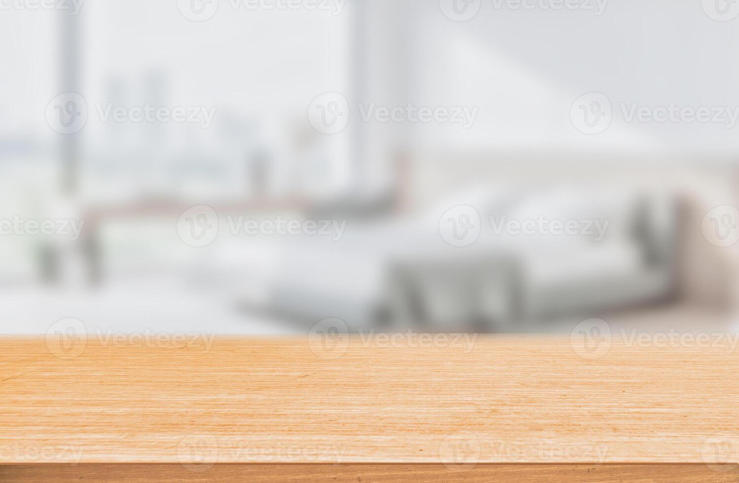 Empty Wooden Table with Blurred Bedroom Background photo