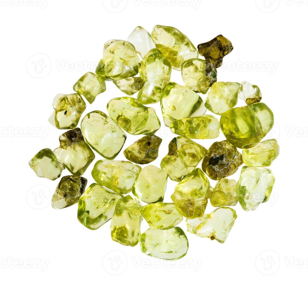 many polished peridot minerals isolated on white photo