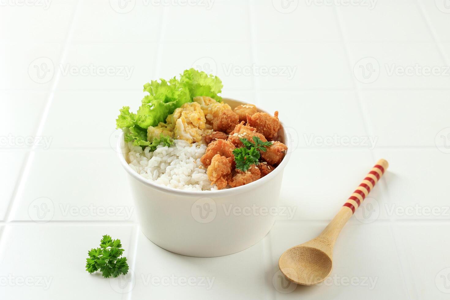 Takeaway Rice Bowl with Chicken Popcorn and Scrambled Eggs photo