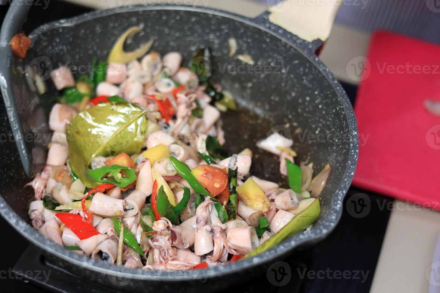 Close Up Cooking Stir Fry Salted Squid photo