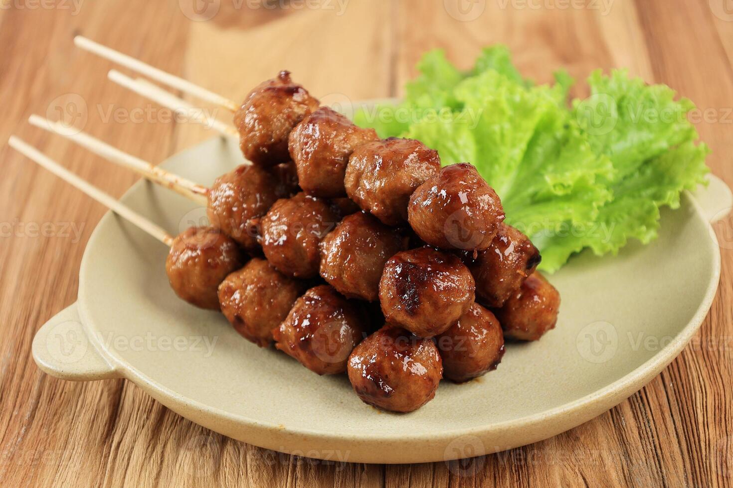 Bakso Bakar, Grilled Meatball in Skewer photo