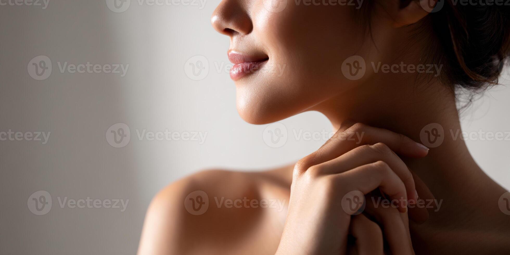 Close-up of a woman's smooth, healthy-looking face and neck photo