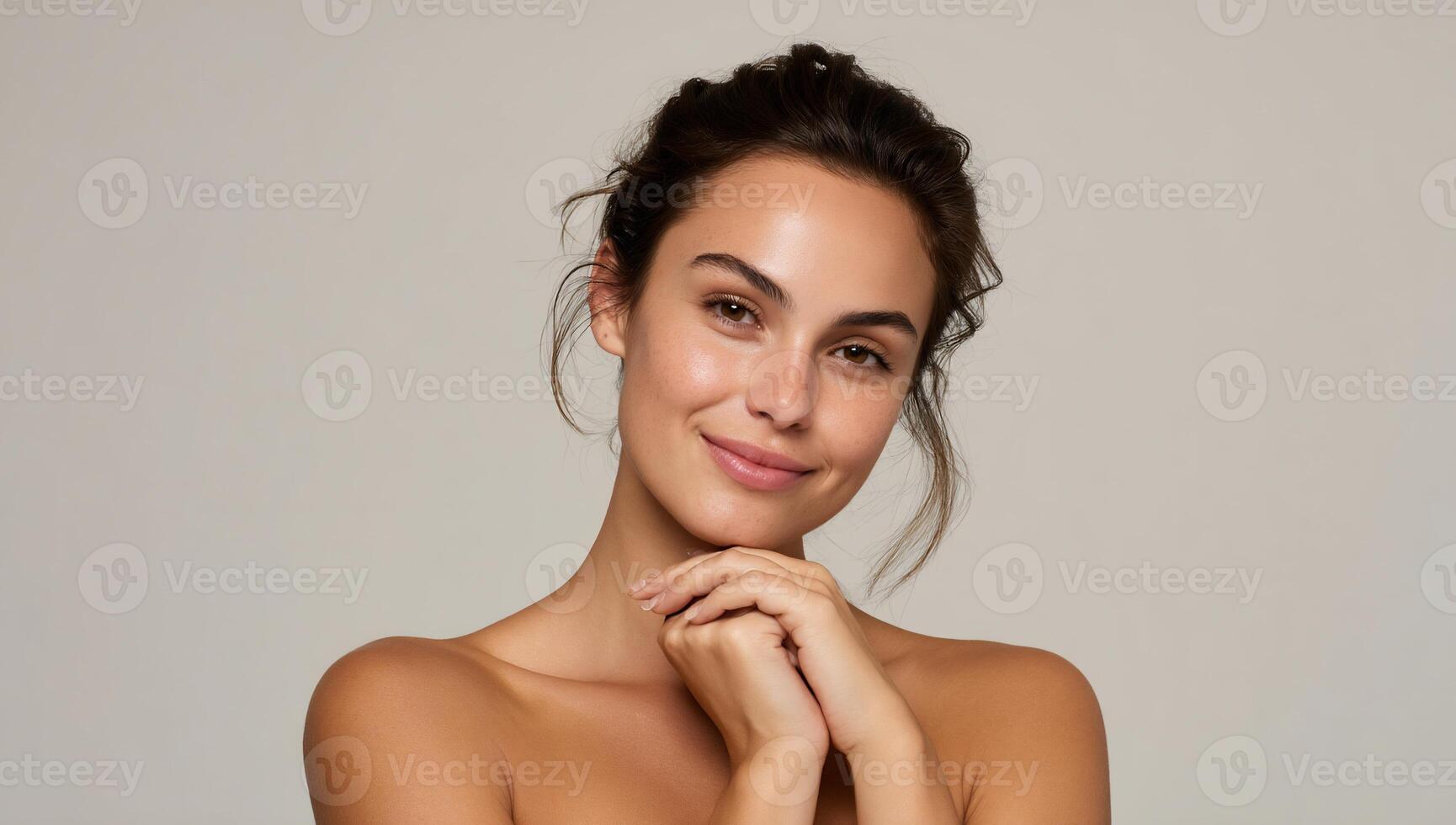 Woman with flawless skin, gentle smile photo