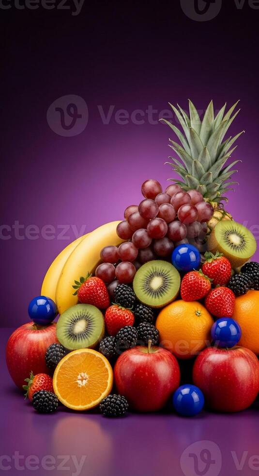 Vibrant Fruit Medley with Pineapple, Grapes, and Berries on Purple Backdrop photo