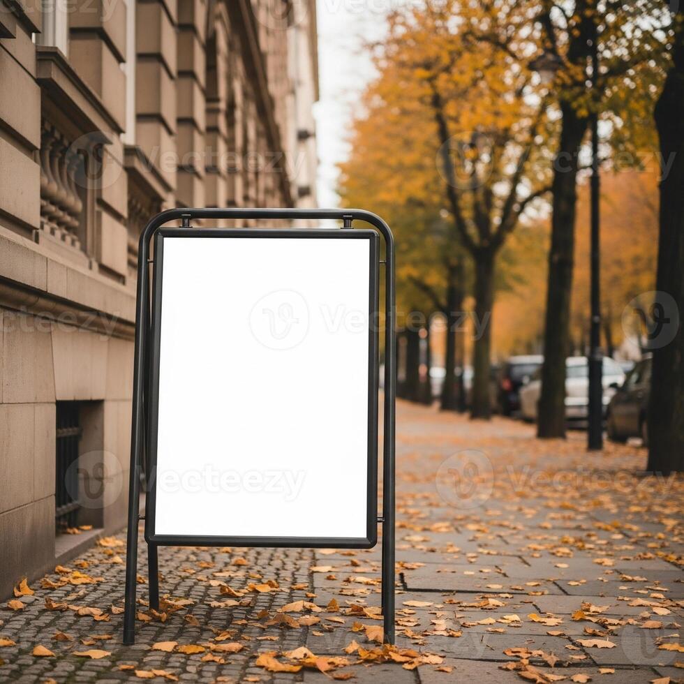 Blank Sign on Autumn Street with Golden Foliage and Historic Building Facade photo