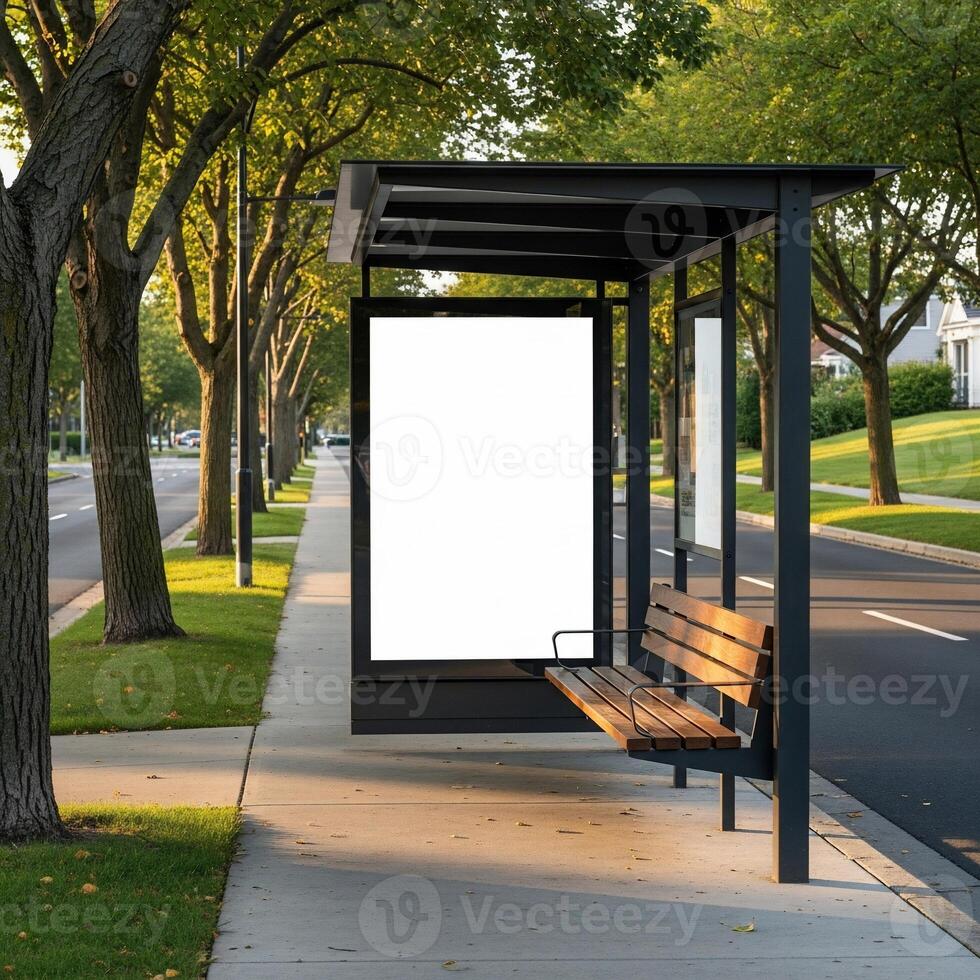 Empty Bus Stop Billboard with Wooden Bench and Tree-Lined Street photo