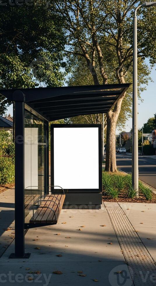 Urban bus stop with blank billboard on a sunny street corner, ready for advertisement photo