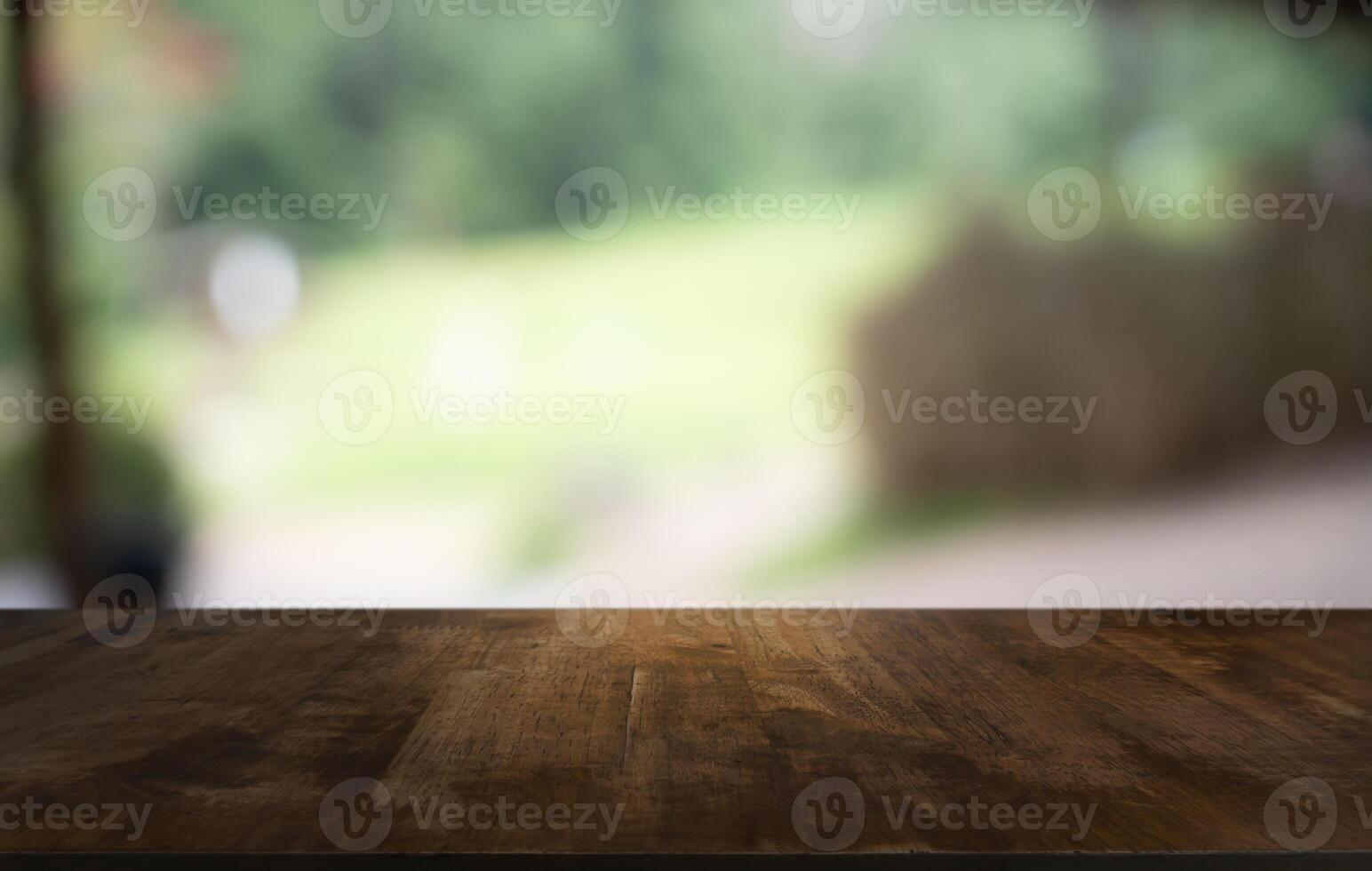 empty wooden table top on blurred view background photo