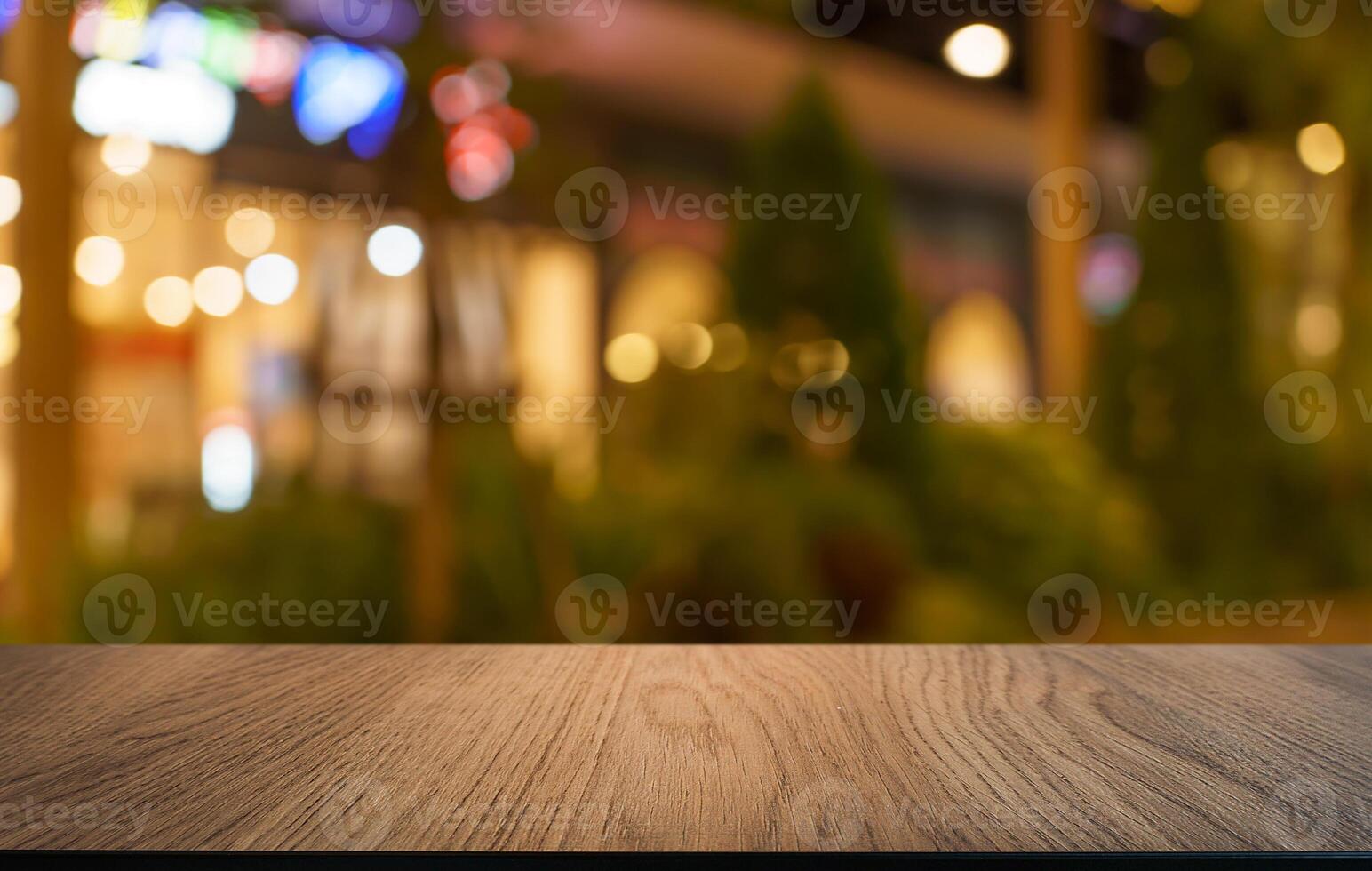 empty wooden table top on a blurred background photo