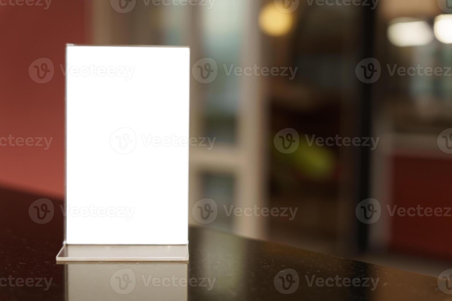 blank white sign on a table in a restaurant photo