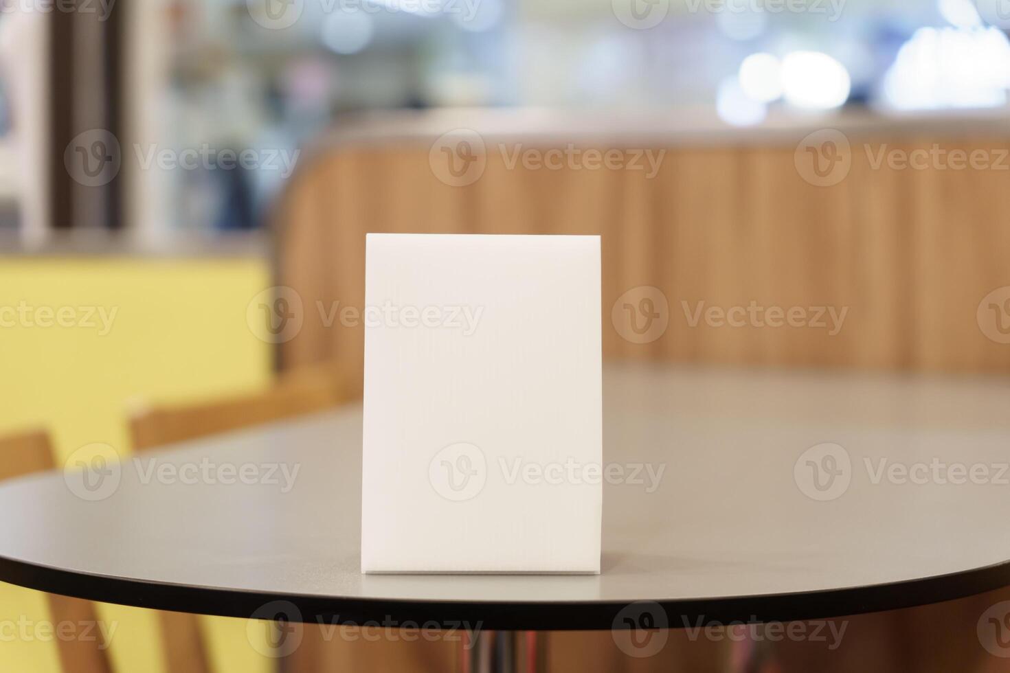 Menu mock up white square box on top of a table photo
