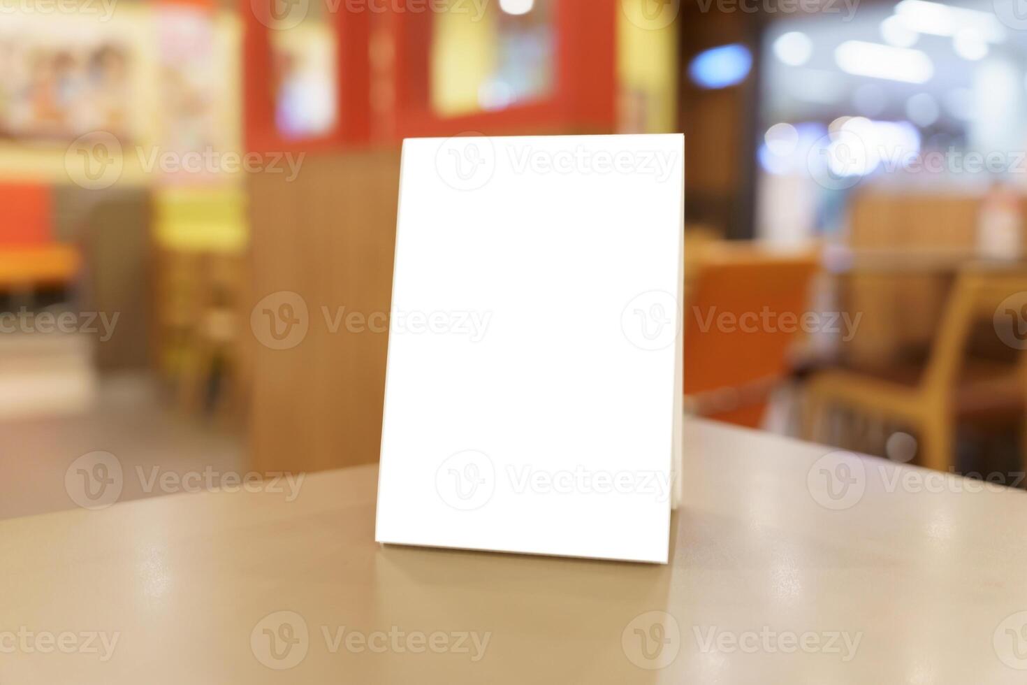 blank menu card on table in restaurant. photo