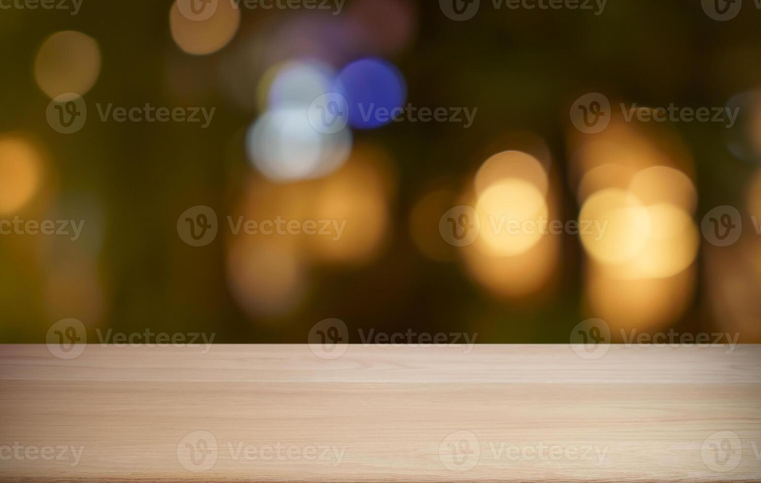empty wooden table top over blurred bokeh background photo