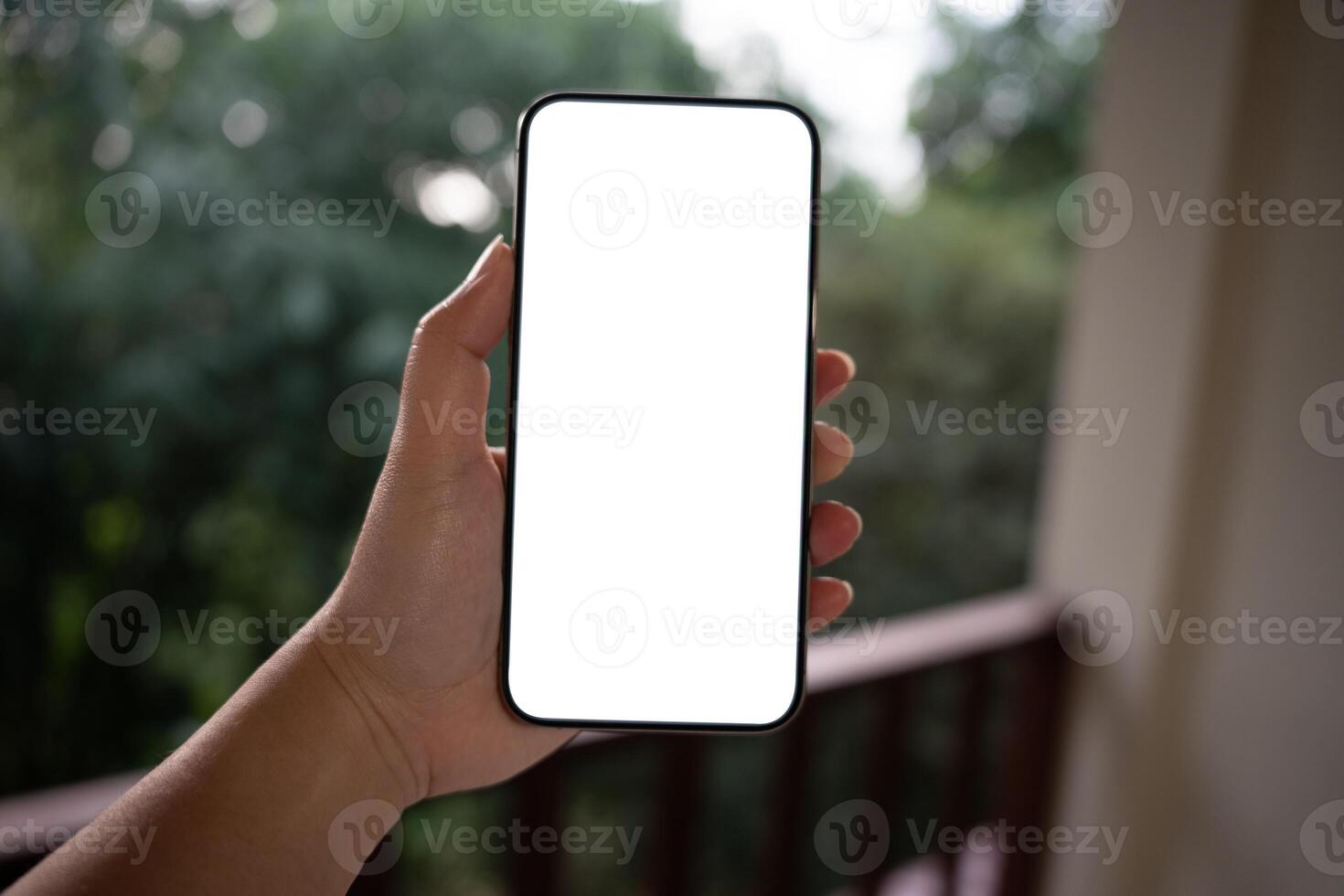Smartphone mockup. Women hands holding cell telephone blank copy space screen smartphone blank white screen isolated technology concept. photo