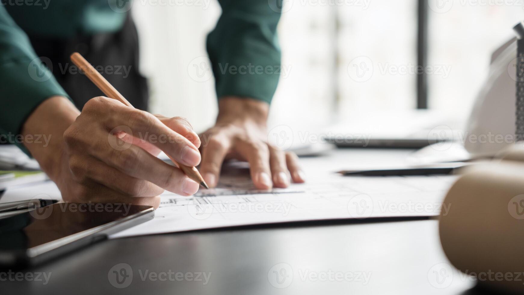 Architecture Man drawing on architectural Creative project business architecture building construction engineering Achievement Planning Design on eco blueprint photo