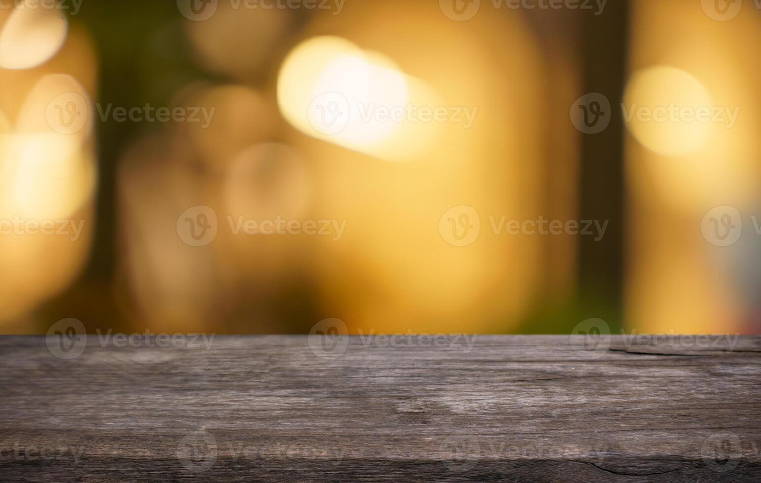 wood table top and blur of restaurant background selective focus product display. photo