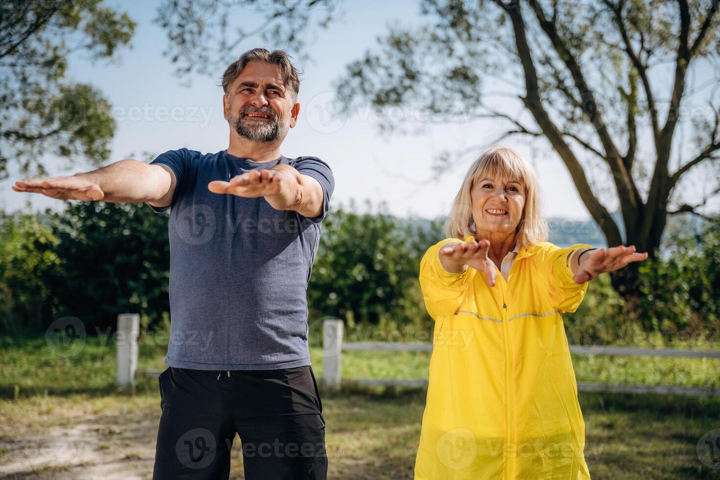 The ,fitness weekend. Senior couple together outdoors at nature photo