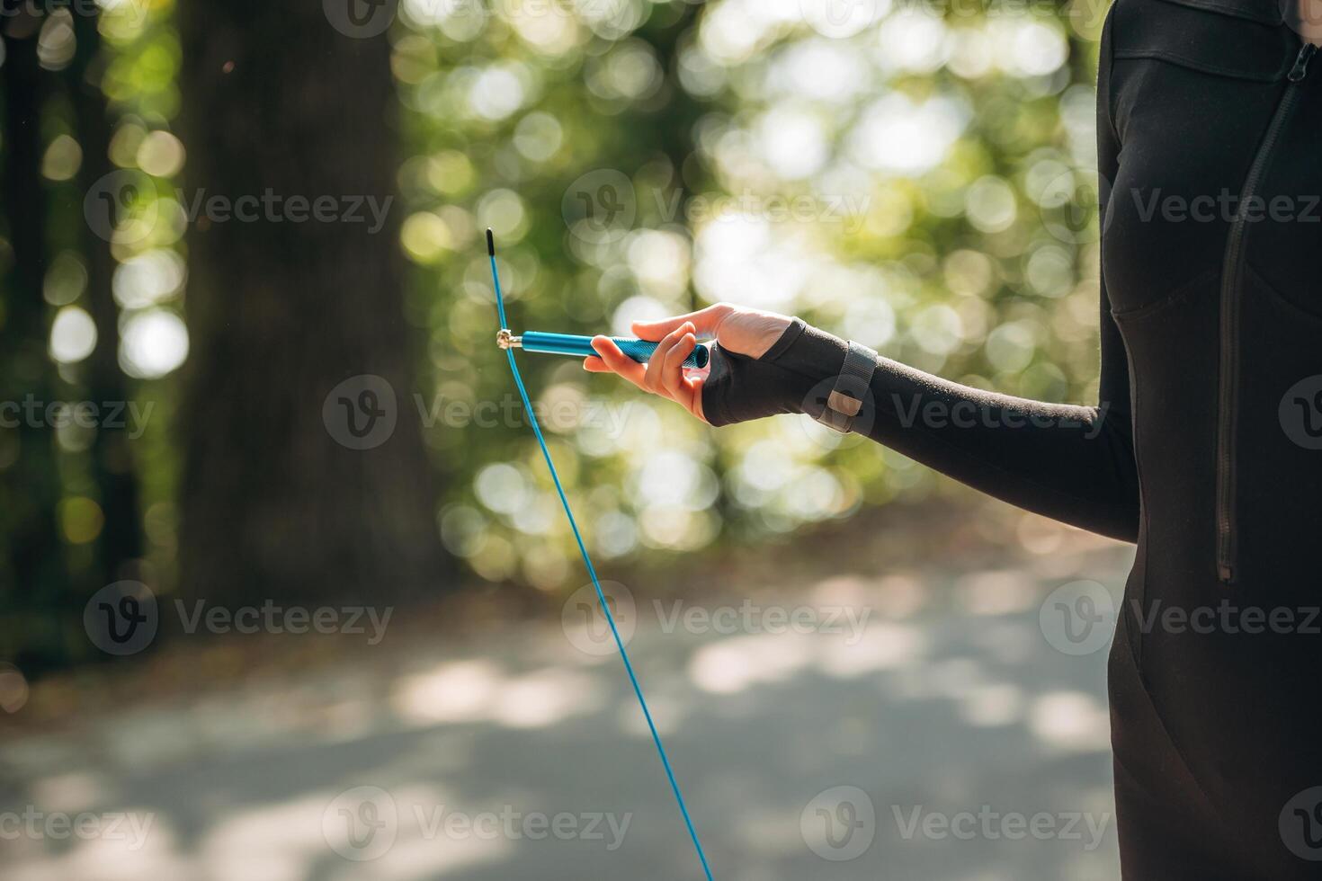Close ,,up ,,view of, woman with jump rope outdoors photo
