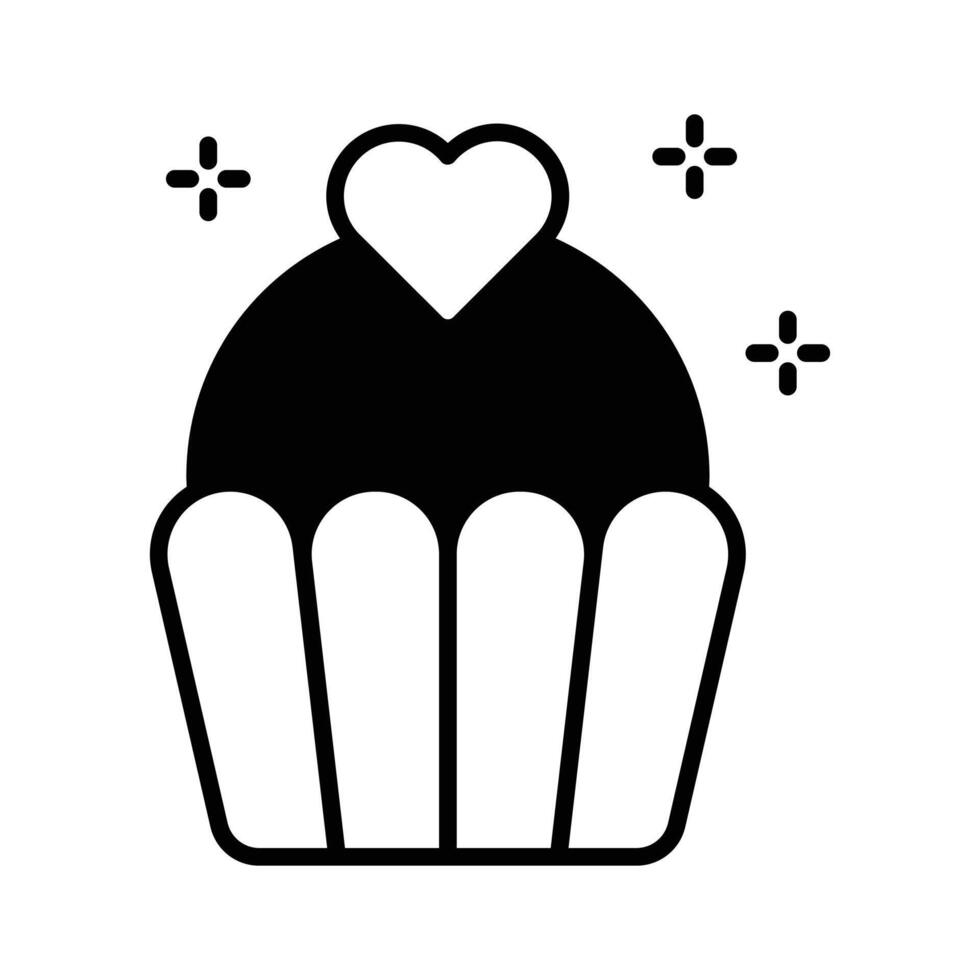 A well crafted glyph style icon of valentine cupcake with heart topping vector