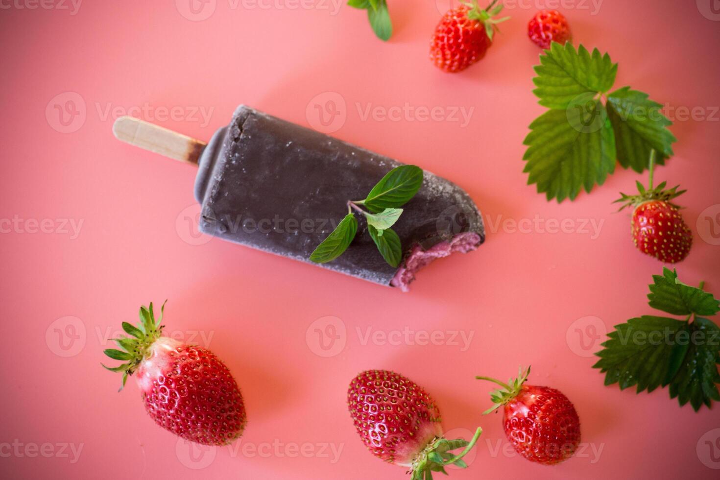 Summer strawberry dessert on a pink background . photo