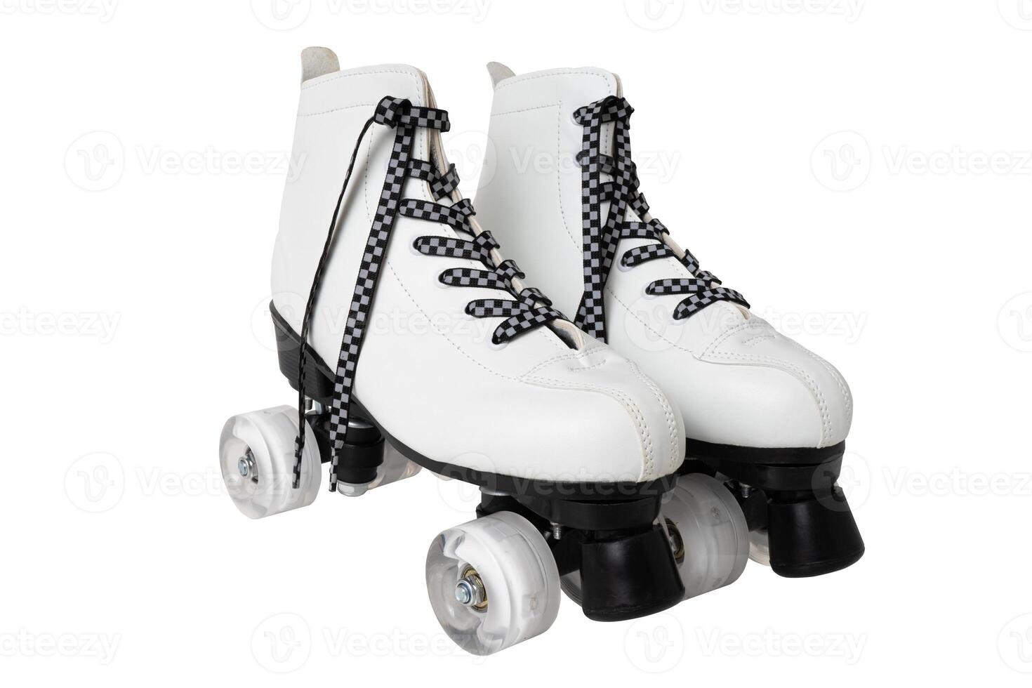 White retro quad roller skates with checkered laces on white background photo