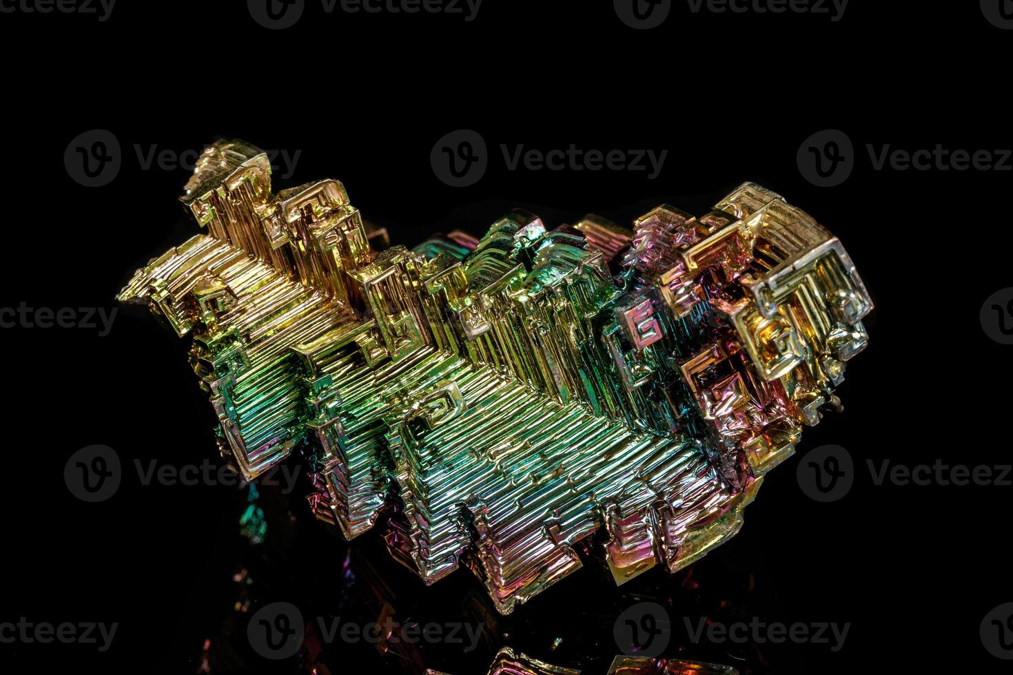 Macro of the stone bismuth, mineral on a black background photo