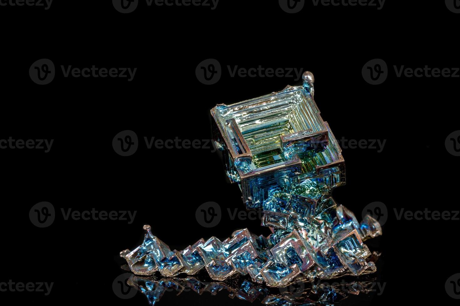 Macro of the stone, bismuth mineral on a black background photo