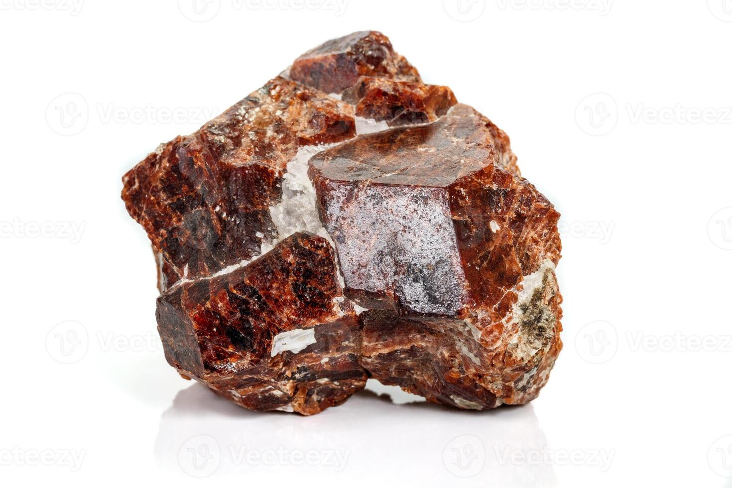 Macro stone Grossular, mineral on white background photo