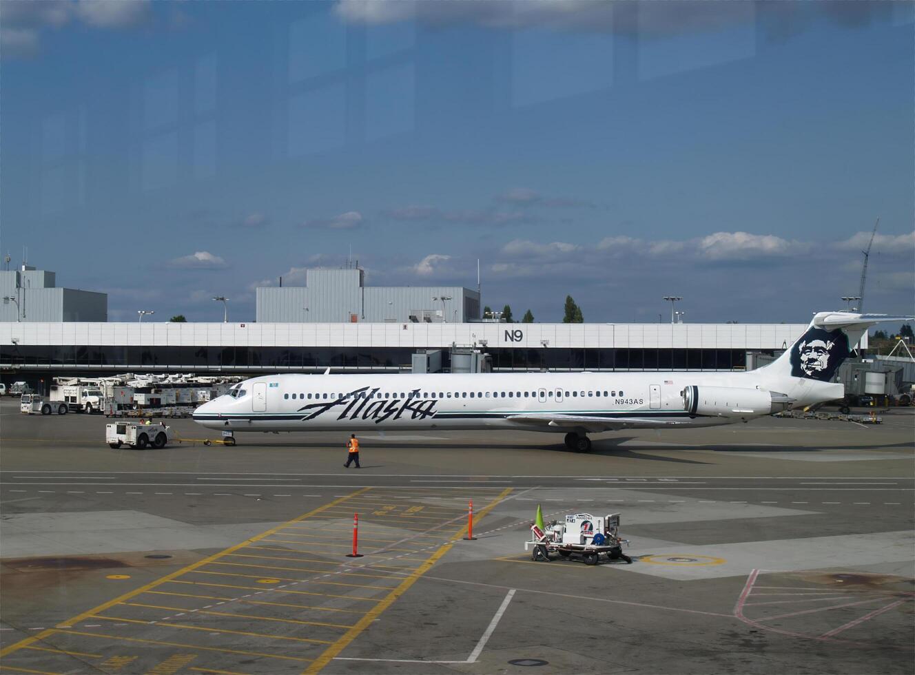 Seattle, WA, 2006 - Commercial Airplane At Airport Terminal With Service People photo