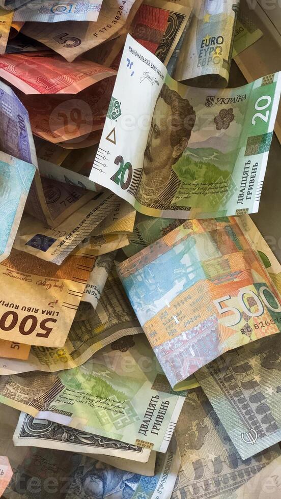 Assorted mix International Banknotes in Glass Container photo