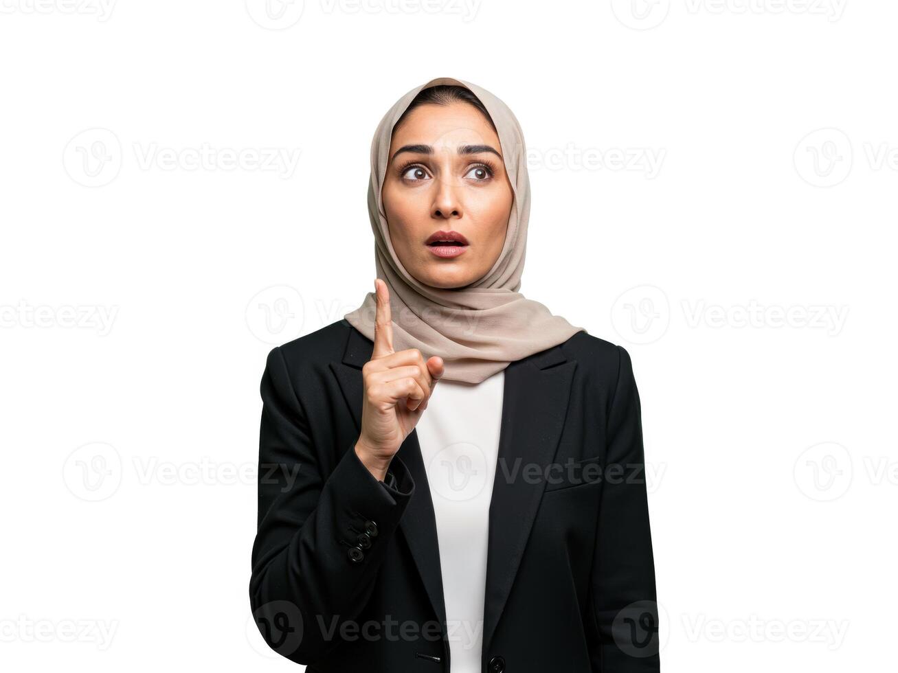 Woman in hijab expressing surprise with raised finger gesture, isolated on white background photo