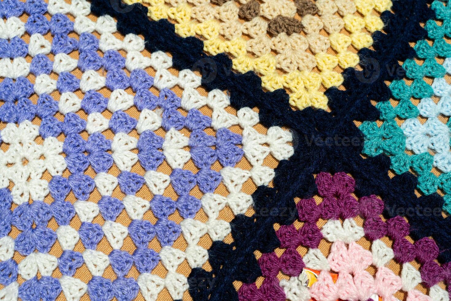 Colorful Crochet Granny Square Blanket Pattern for Handmade Craft and Textile Background photo