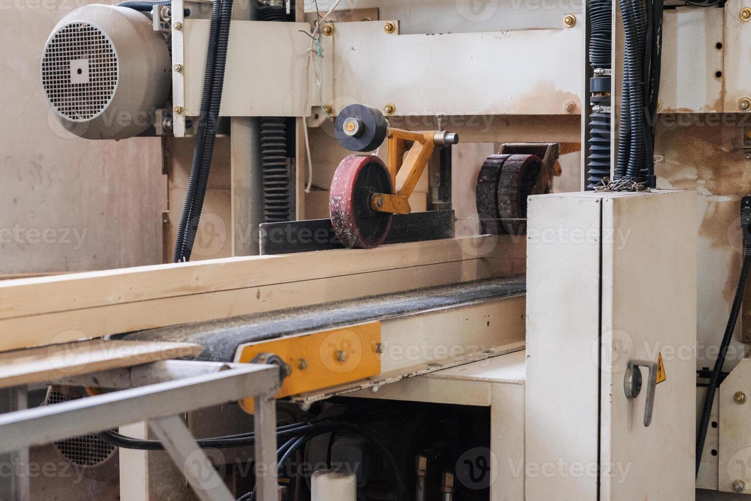 Machine or unit for wood processing at a furniture factory. photo