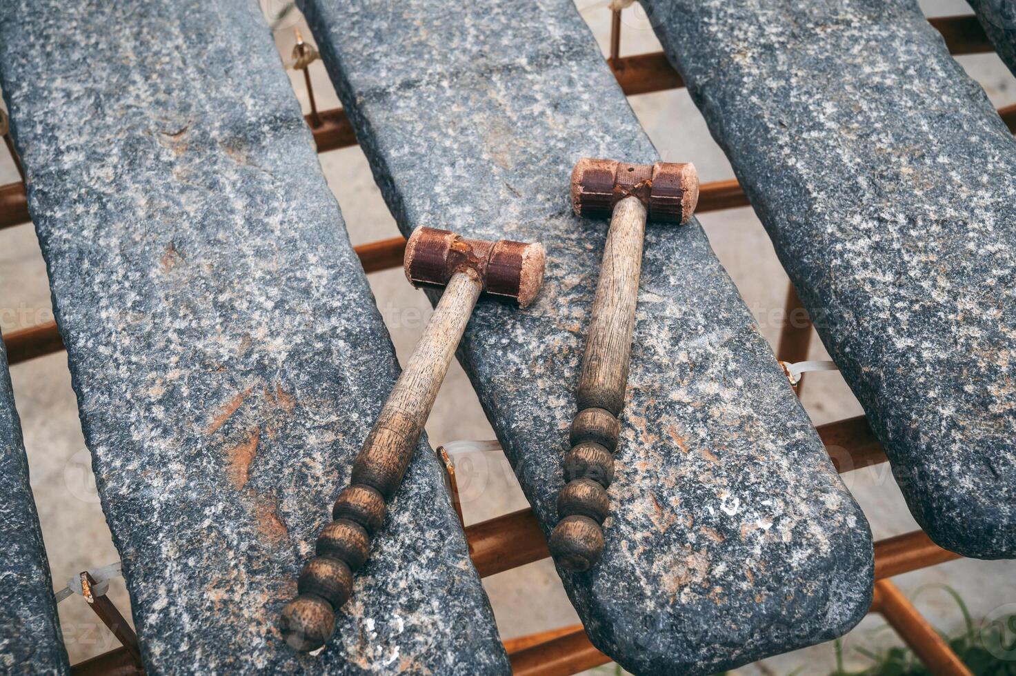 close-up of Dan Da or lithophone. Vietnamese traditional musical instrument. Played by ethnic minority groups in the Central Highlands of Vietnam photo