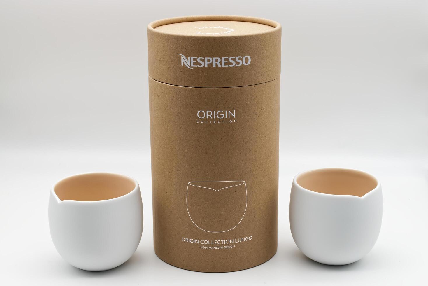 Bologna Italy May 30, 2025 Nespresso origin collection lungo set isolated on white. Each cup is unique, and made of double-walled porcelain, to ensure perfect thermal insulation. photo