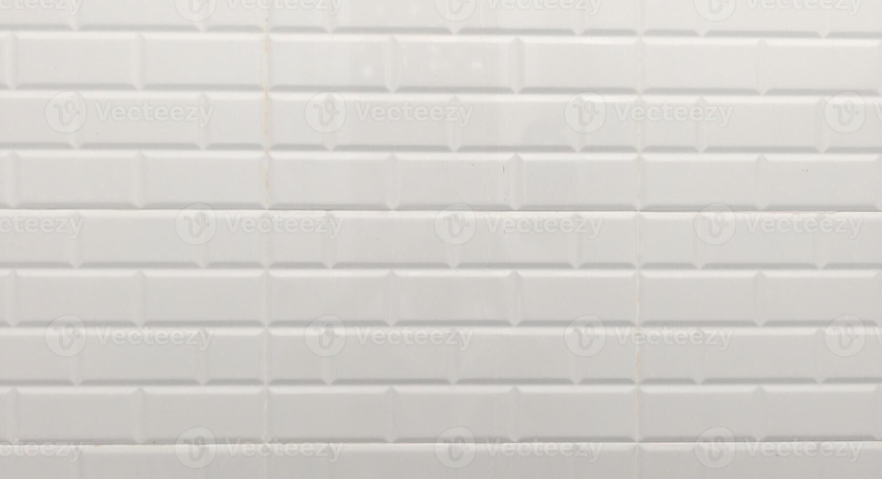 White Subway Tile Wall Background with Clean Geometric Pattern for Modern Interior Design and Architectural Projects photo