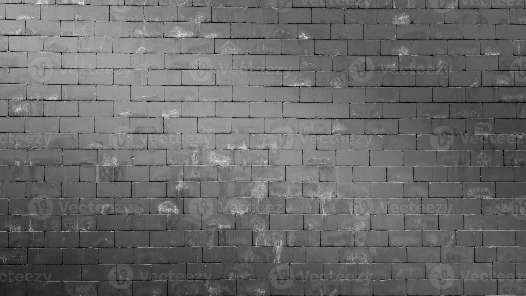 Textured Gray Brick Wall Background for Architectural and Design Projects photo