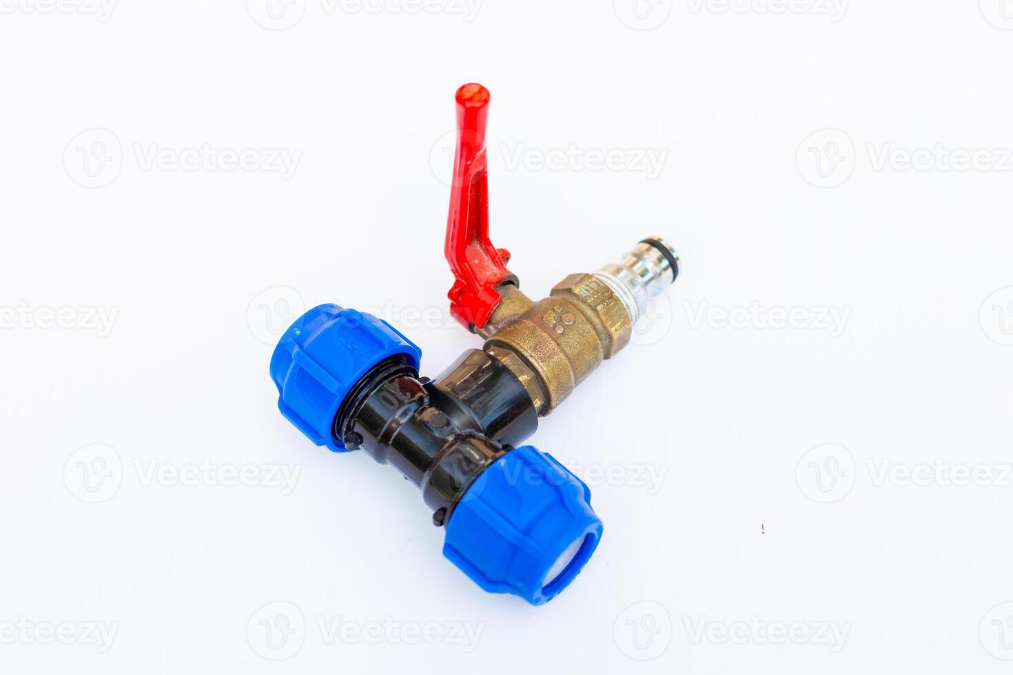 assembled metal faucet with blue plastic fittings and red valve on white background photo