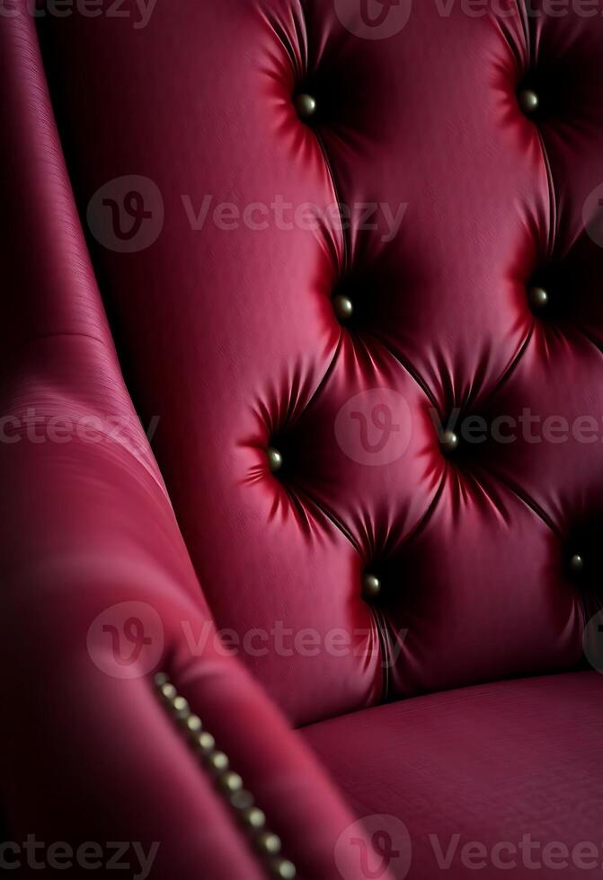 close up of a red chair with buttons on it photo