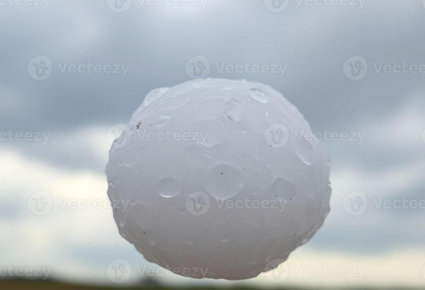 close up of a white ball on a cloudy day photo