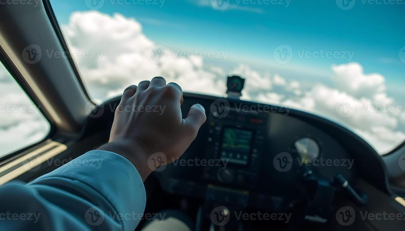 person is flying a small plane in the sky photo