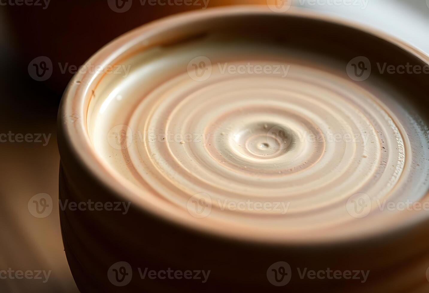 A close up of a cup with a swirl pattern photo