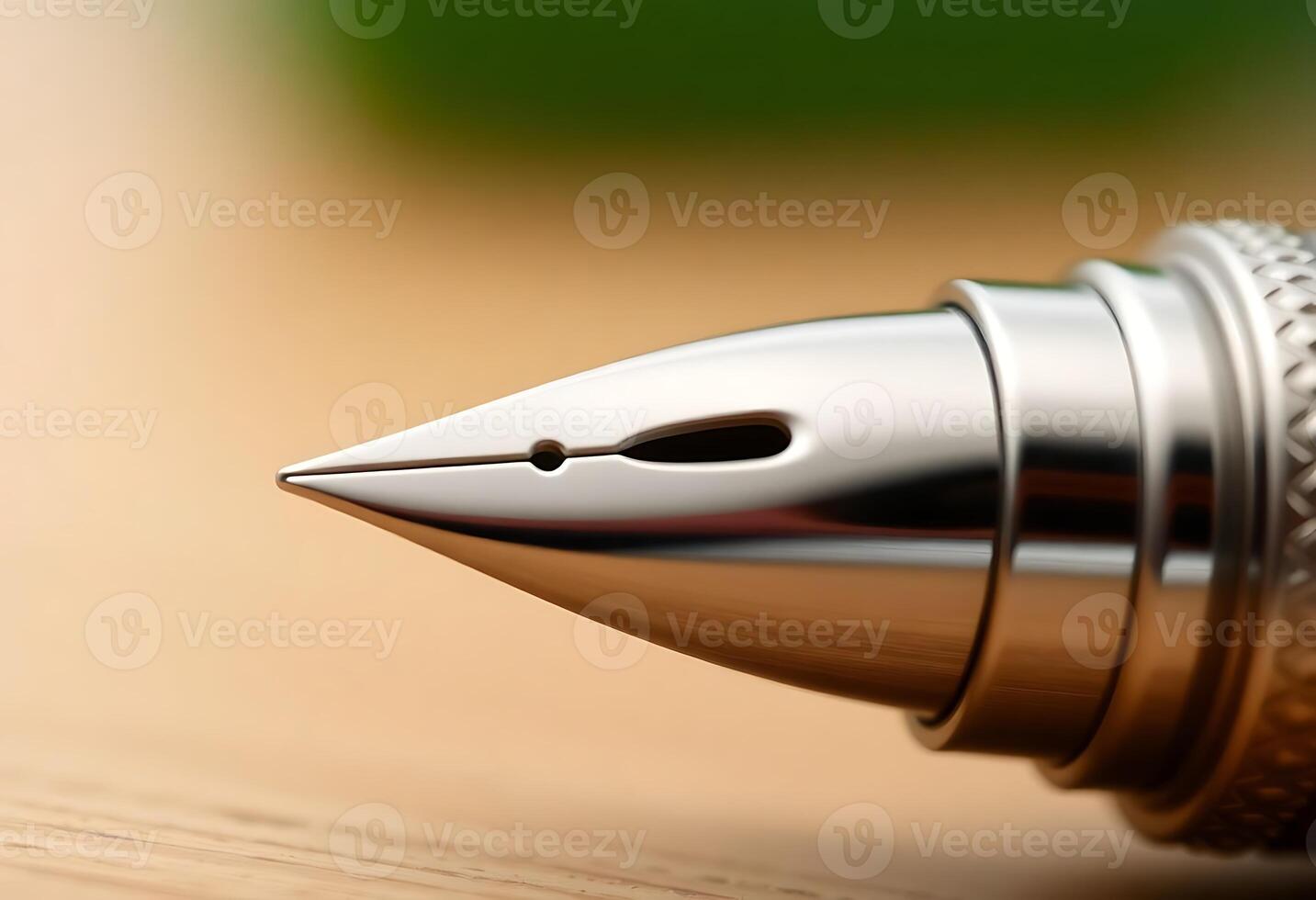 A close up of a fountain pen on a table photo