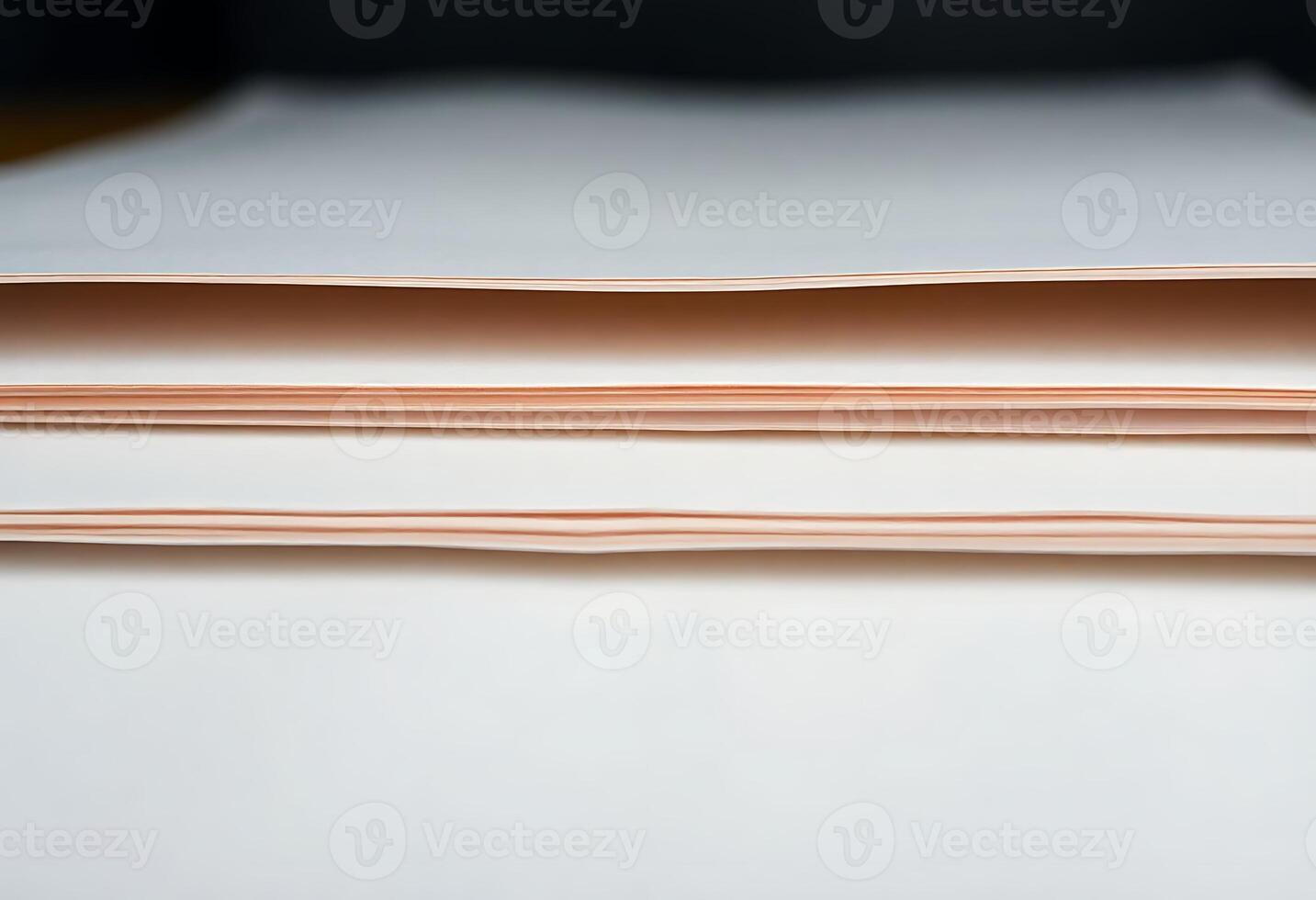 three sheets of white paper stacked on top of each other photo
