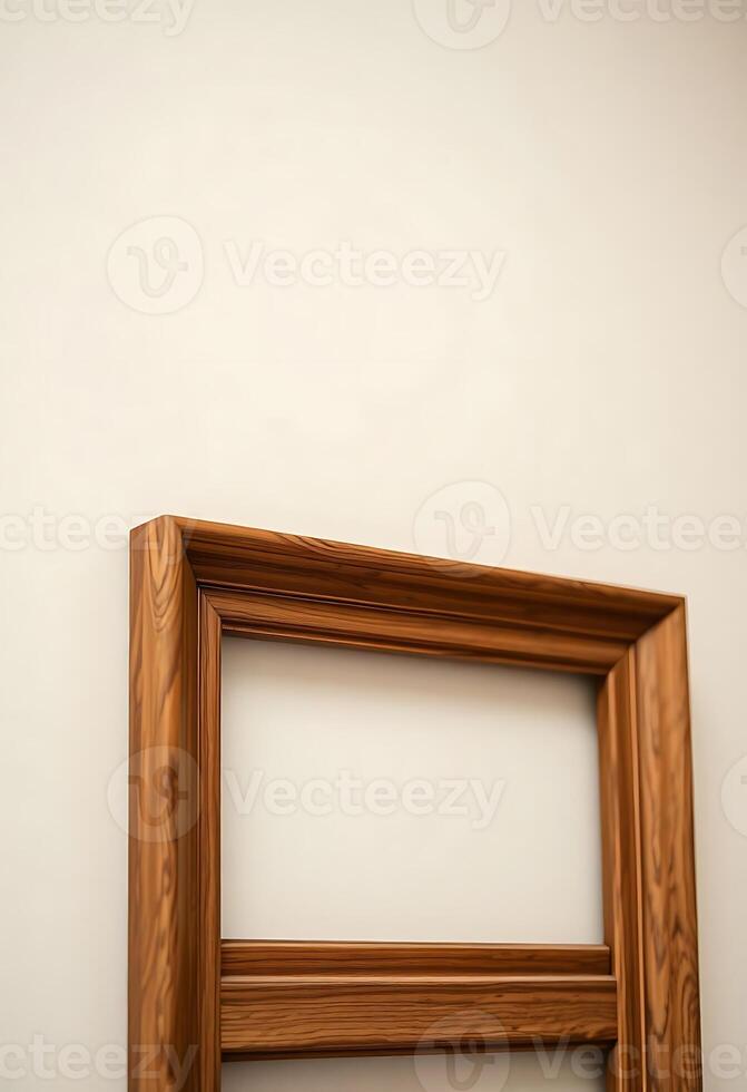A wooden frame on a wall with a white wall photo