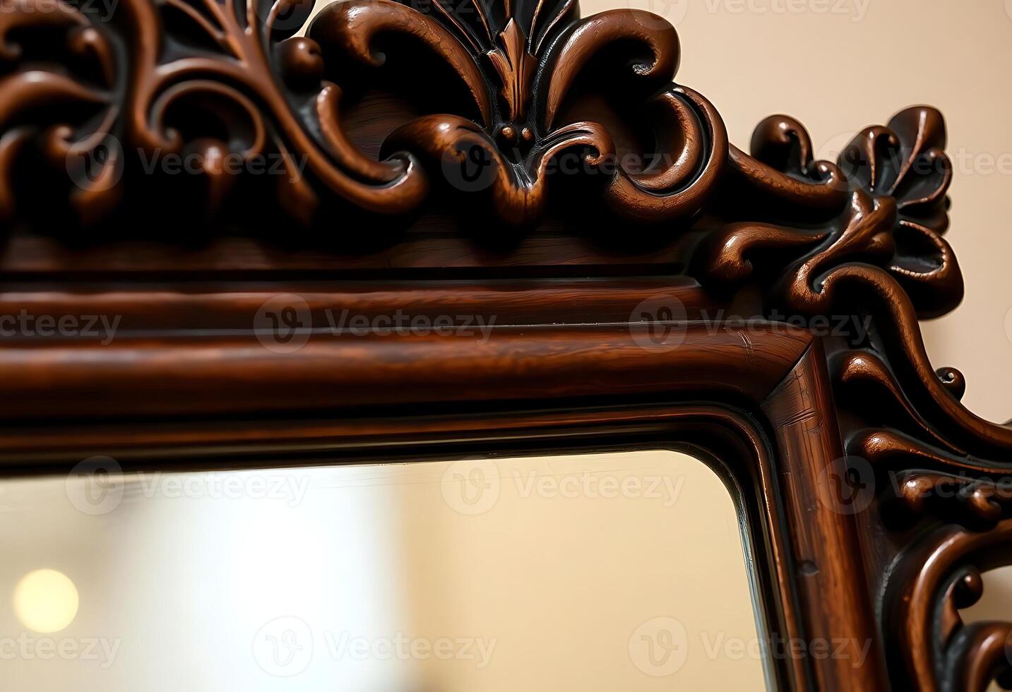 mirror with a wooden frame and a decorative design photo