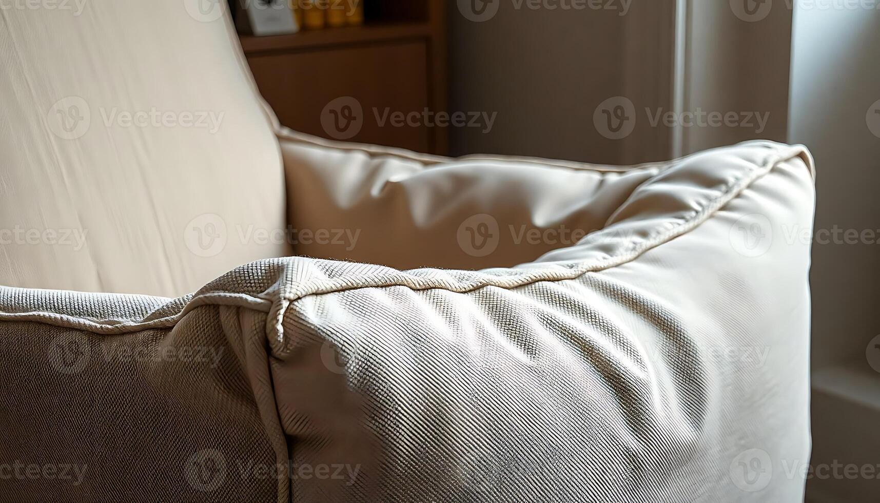 A close up of a chair with a pillow photo